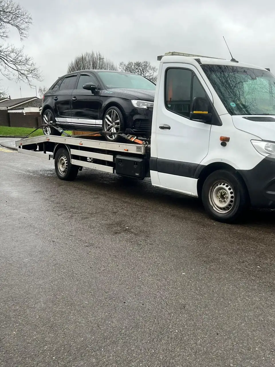 Roadway Assist flatbed recovery vehicle collecting a car in Leicester