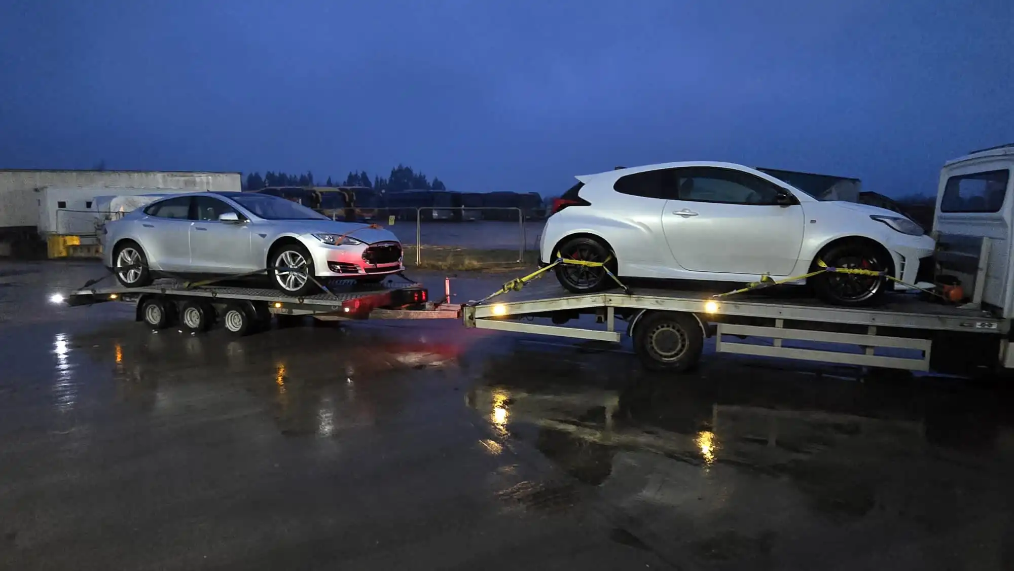 Roadway Assist recovery vehicle on standby at dusk