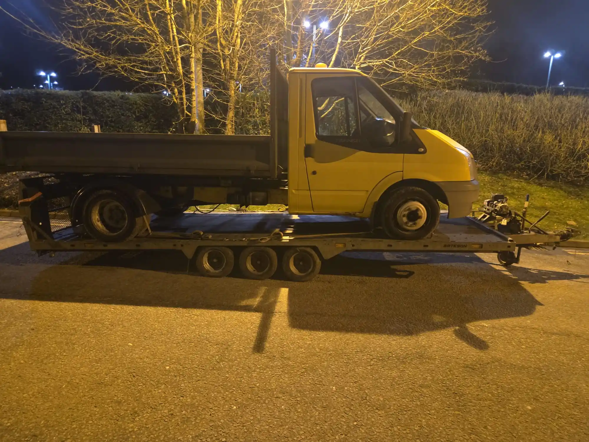 Roadway Assist HGV truck recovery — heavy duty commercial vehicle being loaded onto recovery truck